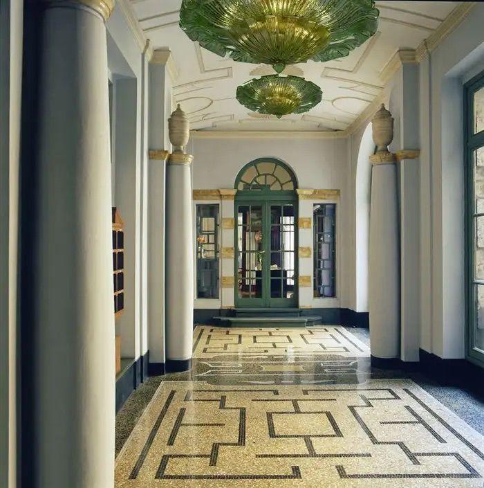 Murano glass ceiling lighting integrated into an elegant boutique hotel interior
