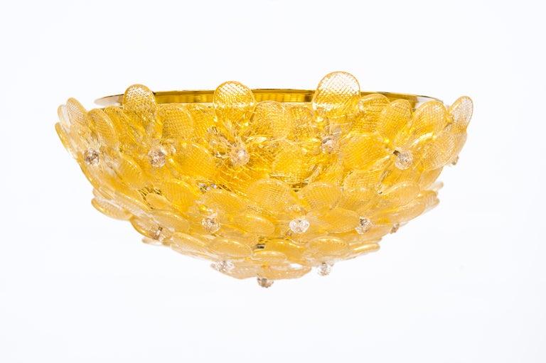 Murano ceiling light with expressive coloured artistic glass elements on a white background