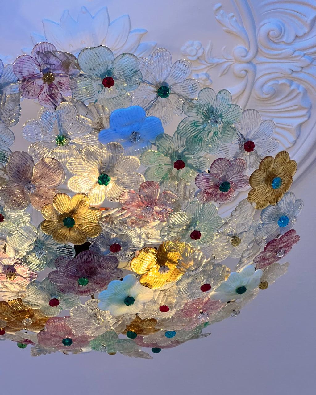 Murano glass ceiling light creating a distinctive decorative feature in an elegant residential interior