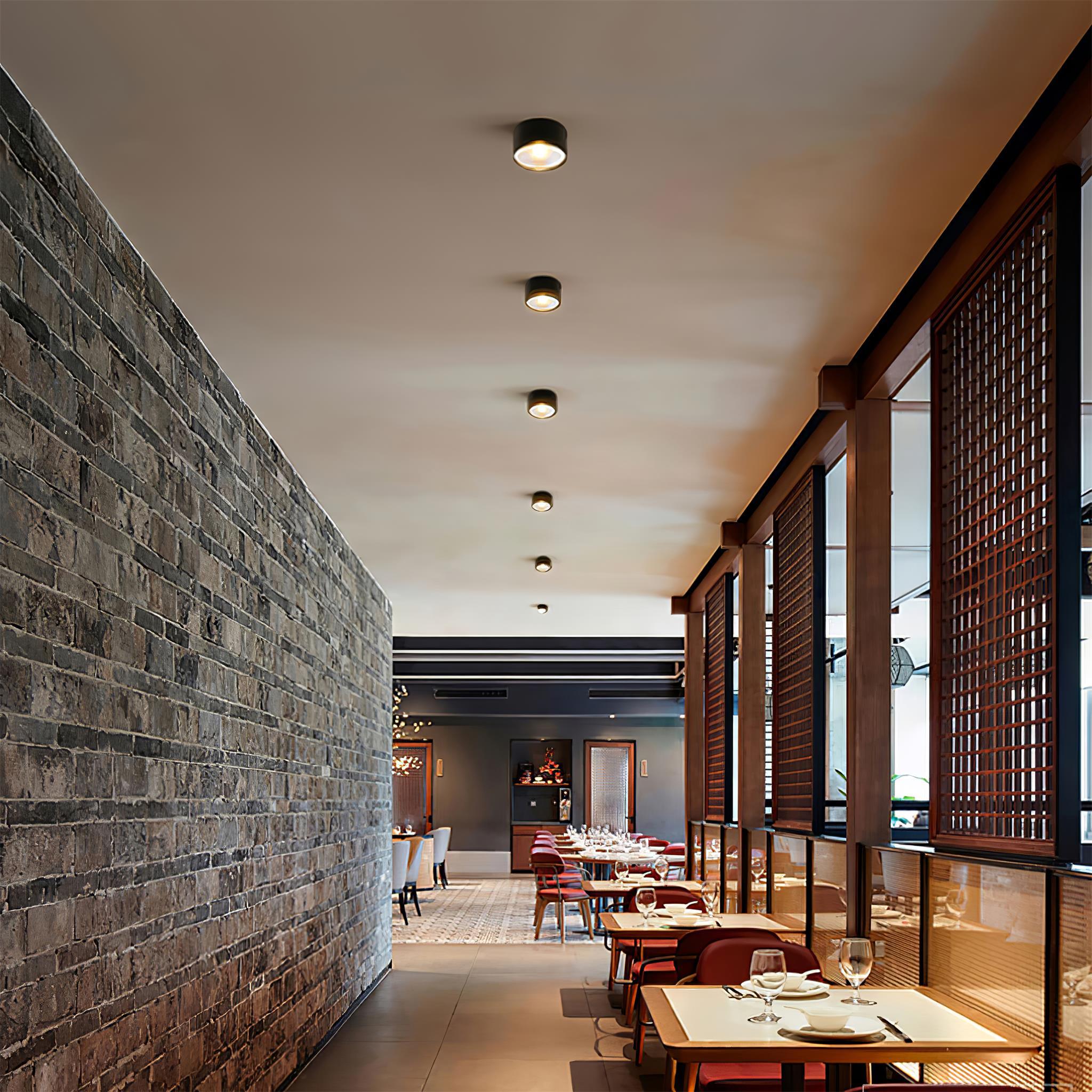 Surface-mounted spotlights installed in a contemporary hospitality interior.