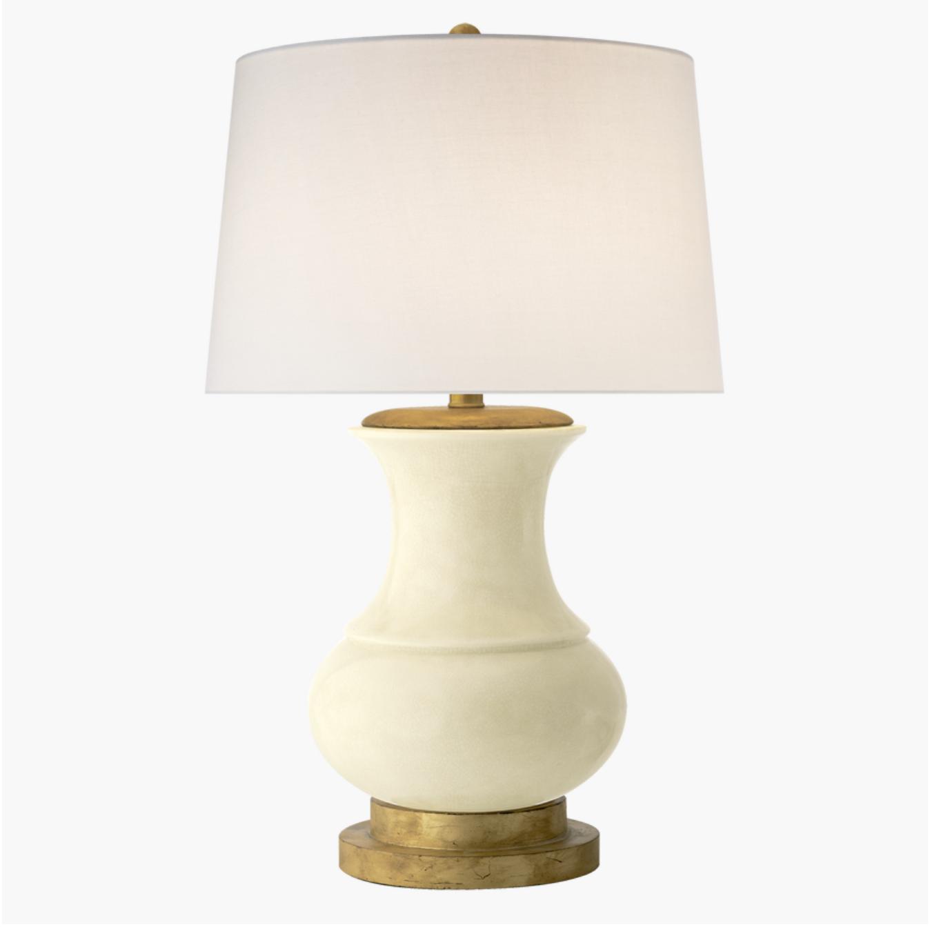 Luxury table lamp photographed on a clean white background showcasing premium materials and refined craftsmanship.