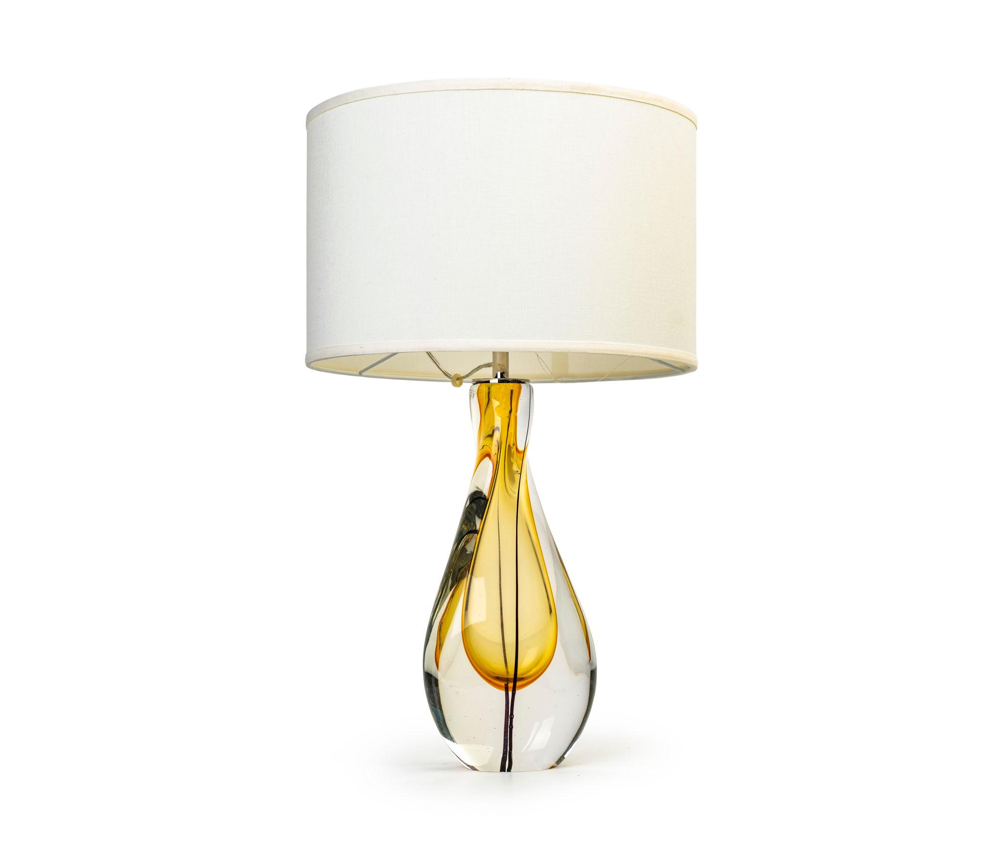 Luxury table lamp photographed on a clean white background showcasing premium materials and refined craftsmanship.