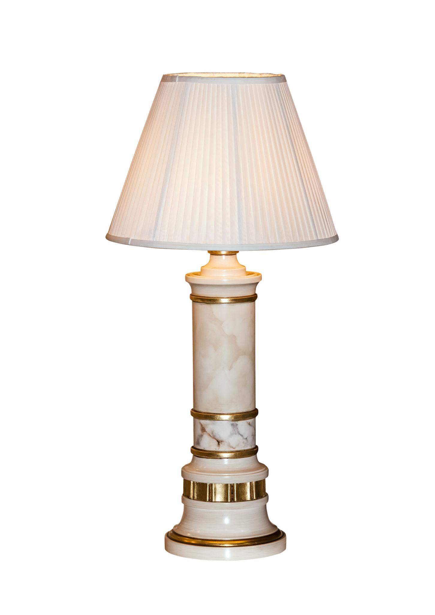 Luxury table lamp photographed on a clean white background showcasing premium materials and refined craftsmanship.