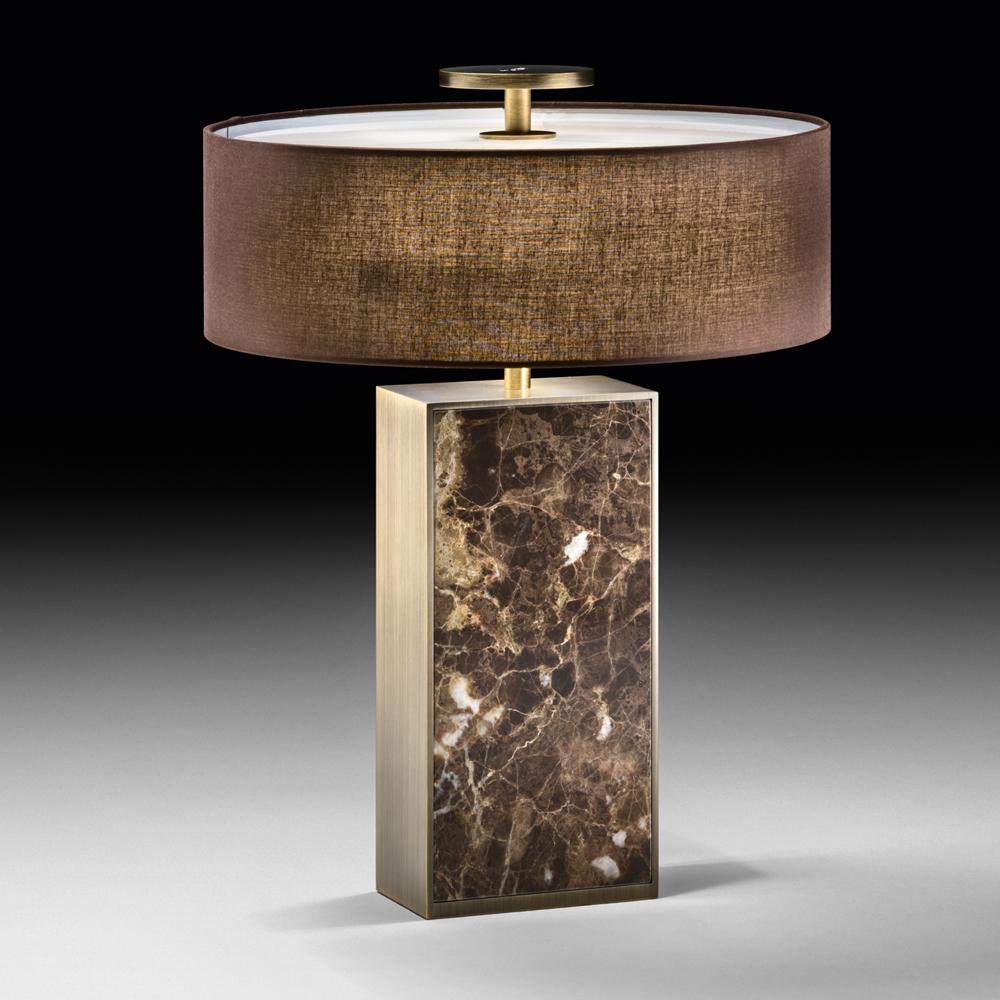 Front view of a luxury table lamp highlighting elegant proportions and sophisticated architectural detailing.
