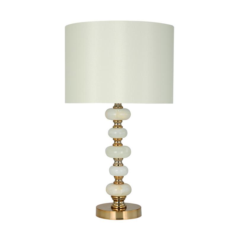 Luxury table lamp photographed on a clean white background showcasing premium materials and refined craftsmanship.