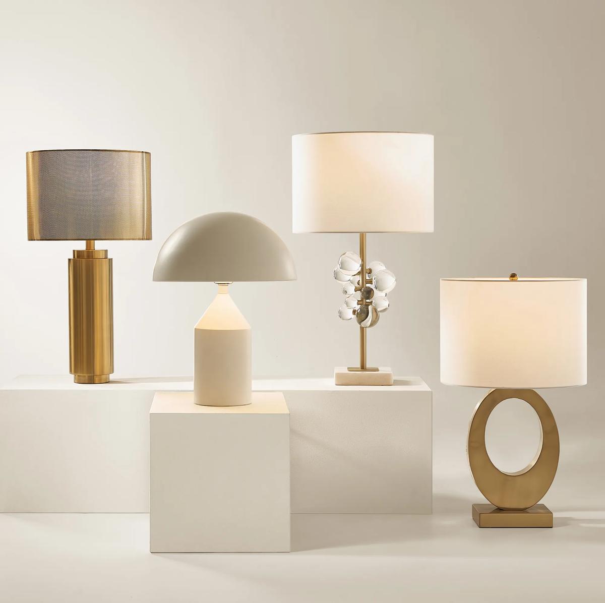 Collection of luxury table lamps featuring premium materials and exclusive decorative finishes for hospitality interiors.
