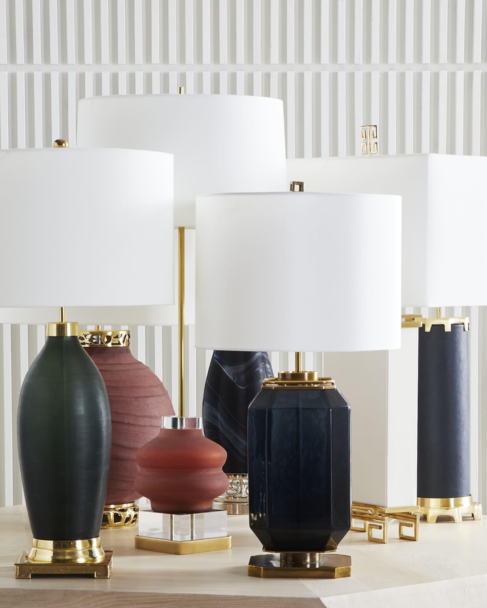 Collection of luxury table lamps featuring premium materials and exclusive decorative finishes for hospitality interiors.