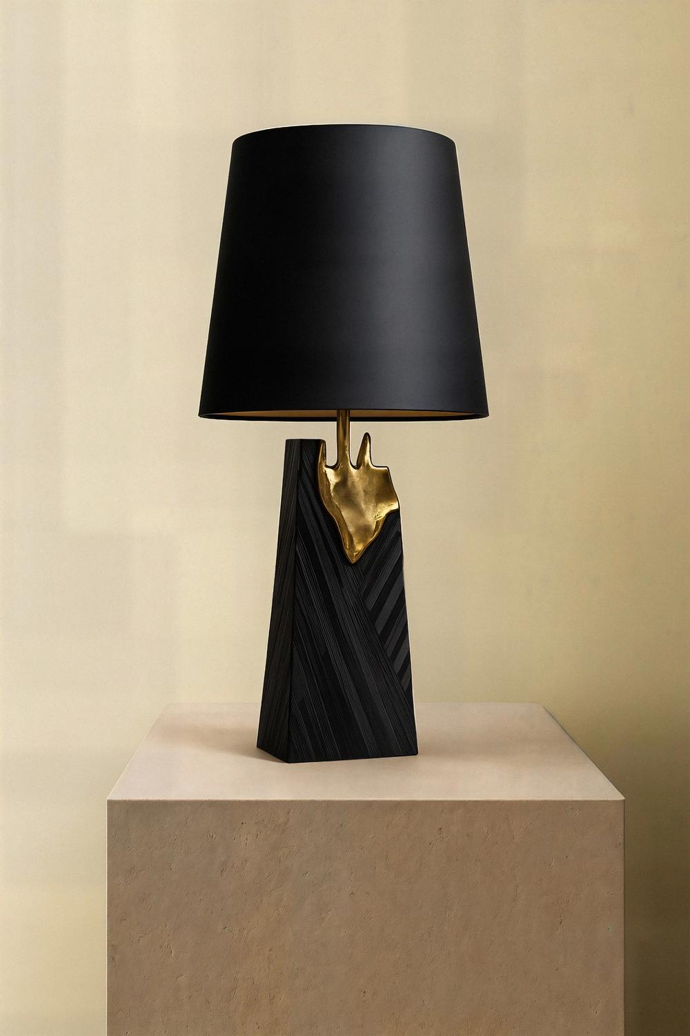 Front view of a luxury table lamp highlighting elegant proportions and sophisticated architectural detailing.