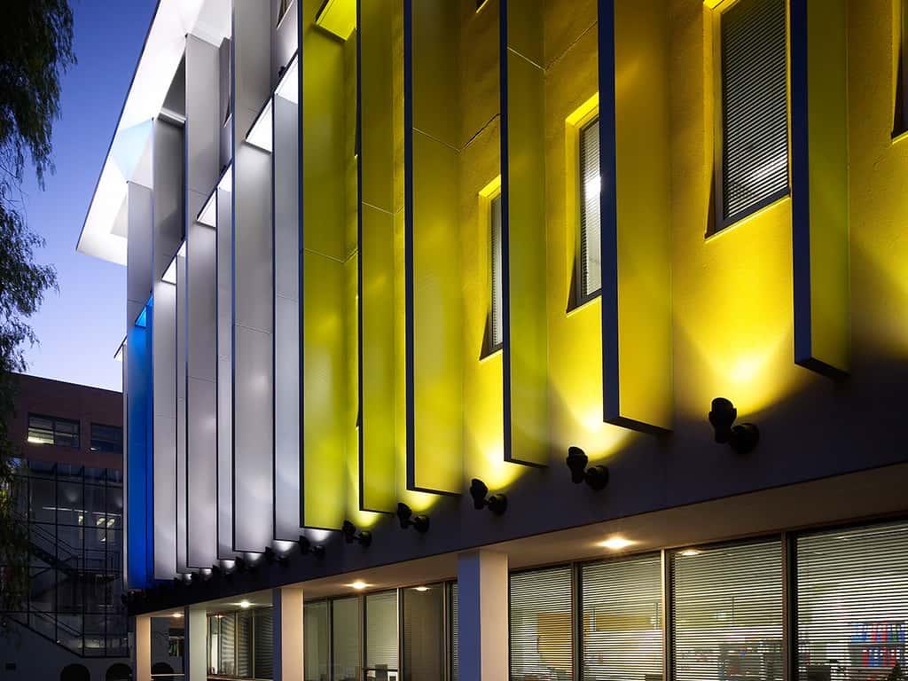 Architectural LED floodlights illuminating a contemporary building façade.