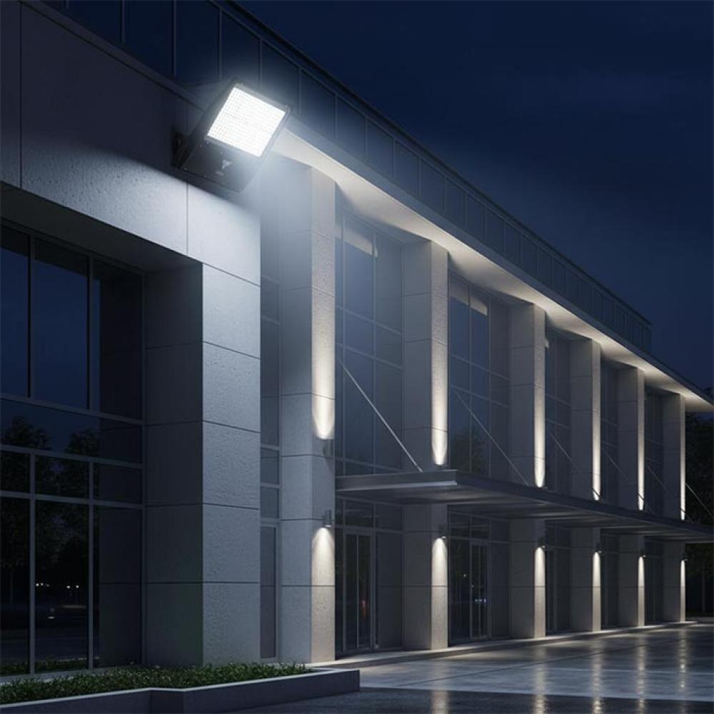 Architectural LED floodlights illuminating a contemporary building façade.