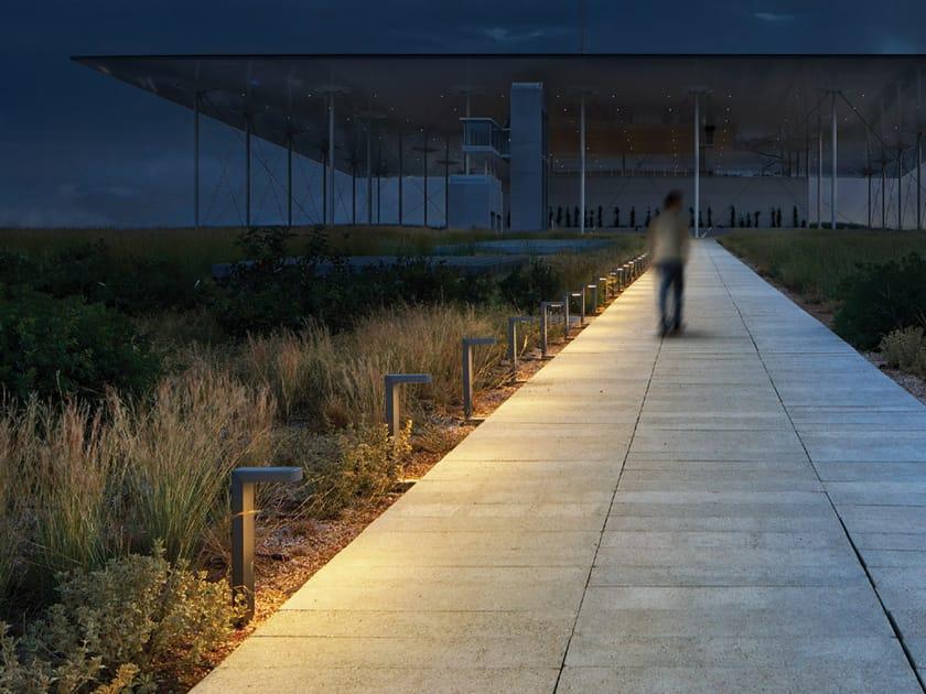 Anti-glare bollard lights installed along a contemporary public pedestrian pathway.