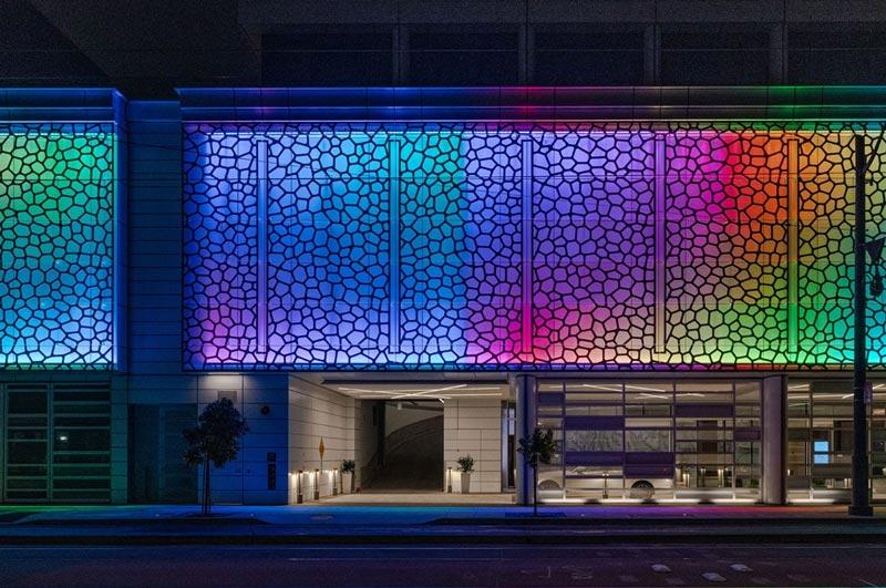 DMX lighting control system operating a dynamic architectural façade lighting installation.
