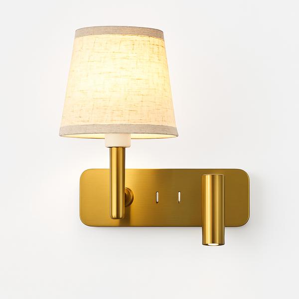 Front view of a bedside wall lamp with integrated reading light and refined finish.