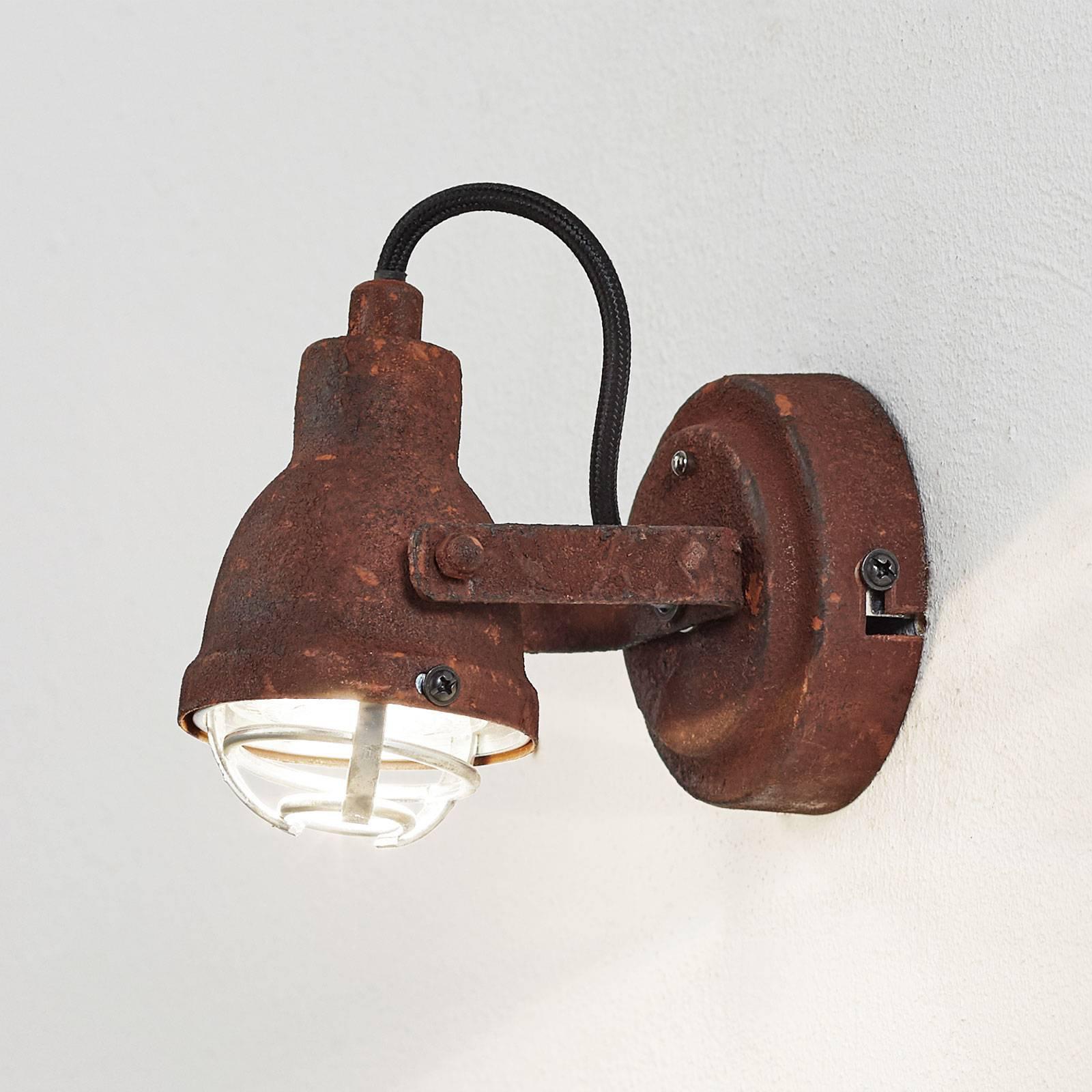 Front view of an industrial-style wall lamp with minimalist architectural detailing.