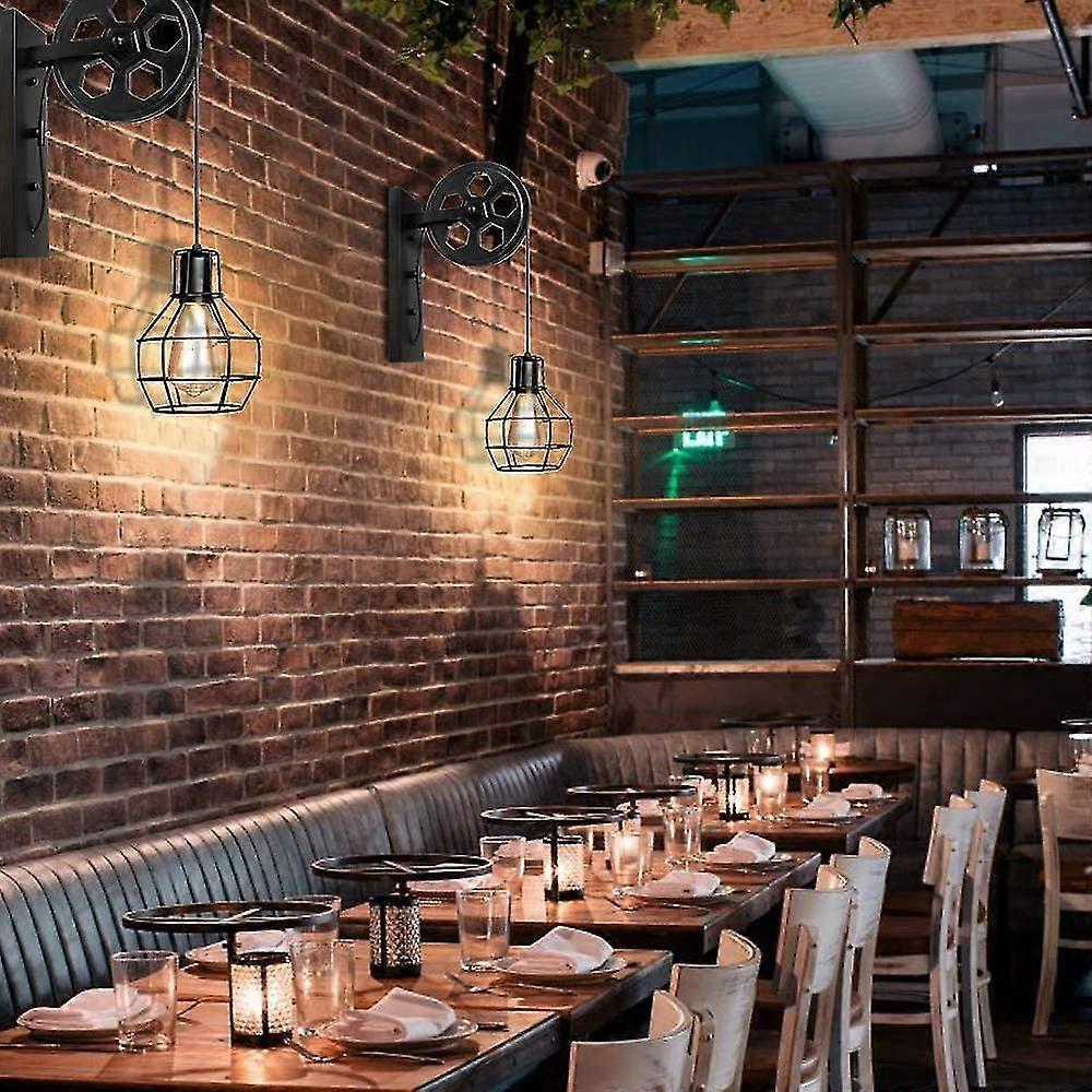 Industrial wall lamp installed in a contemporary restaurant with industrial architectural styling.