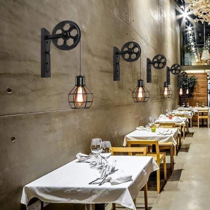 Industrial wall lamp installed in a contemporary restaurant with industrial architectural styling.