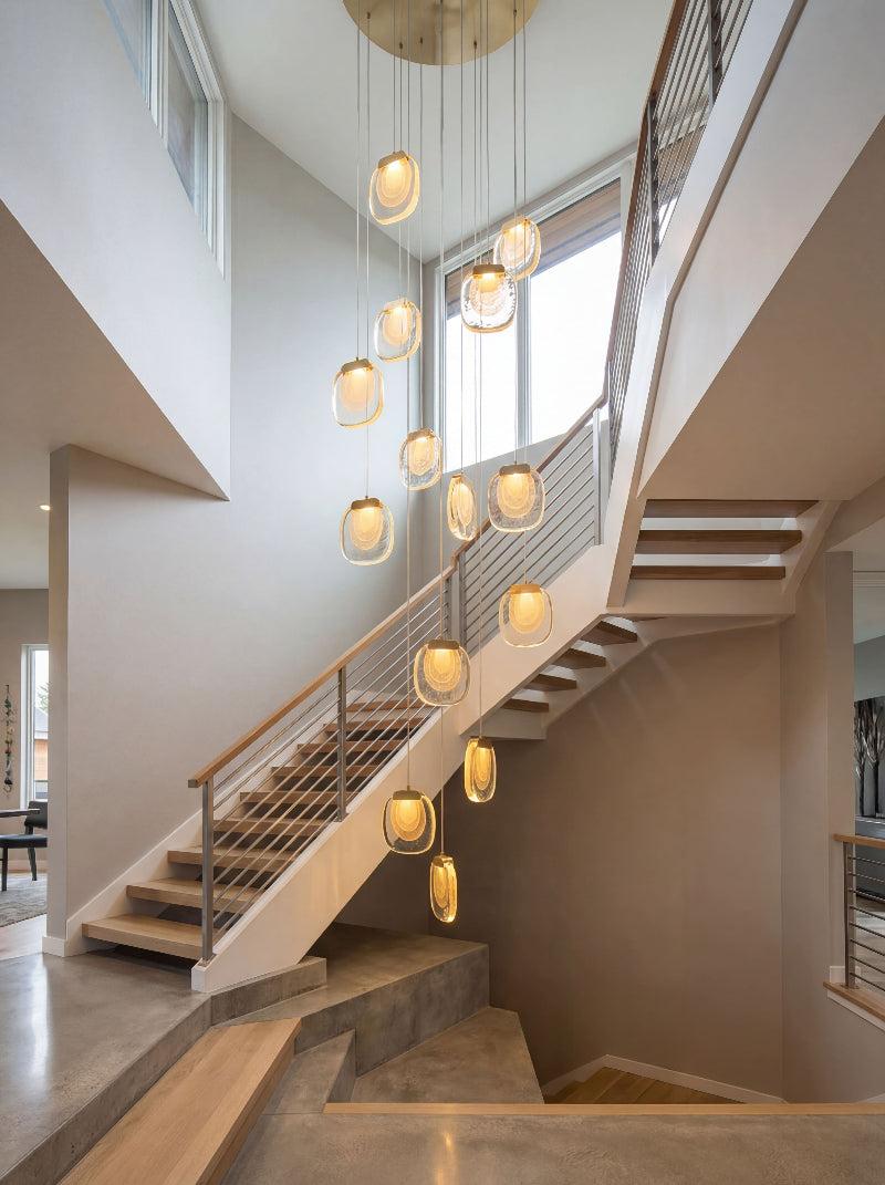Cluster pendant lighting installed in a luxury hospitality interior.