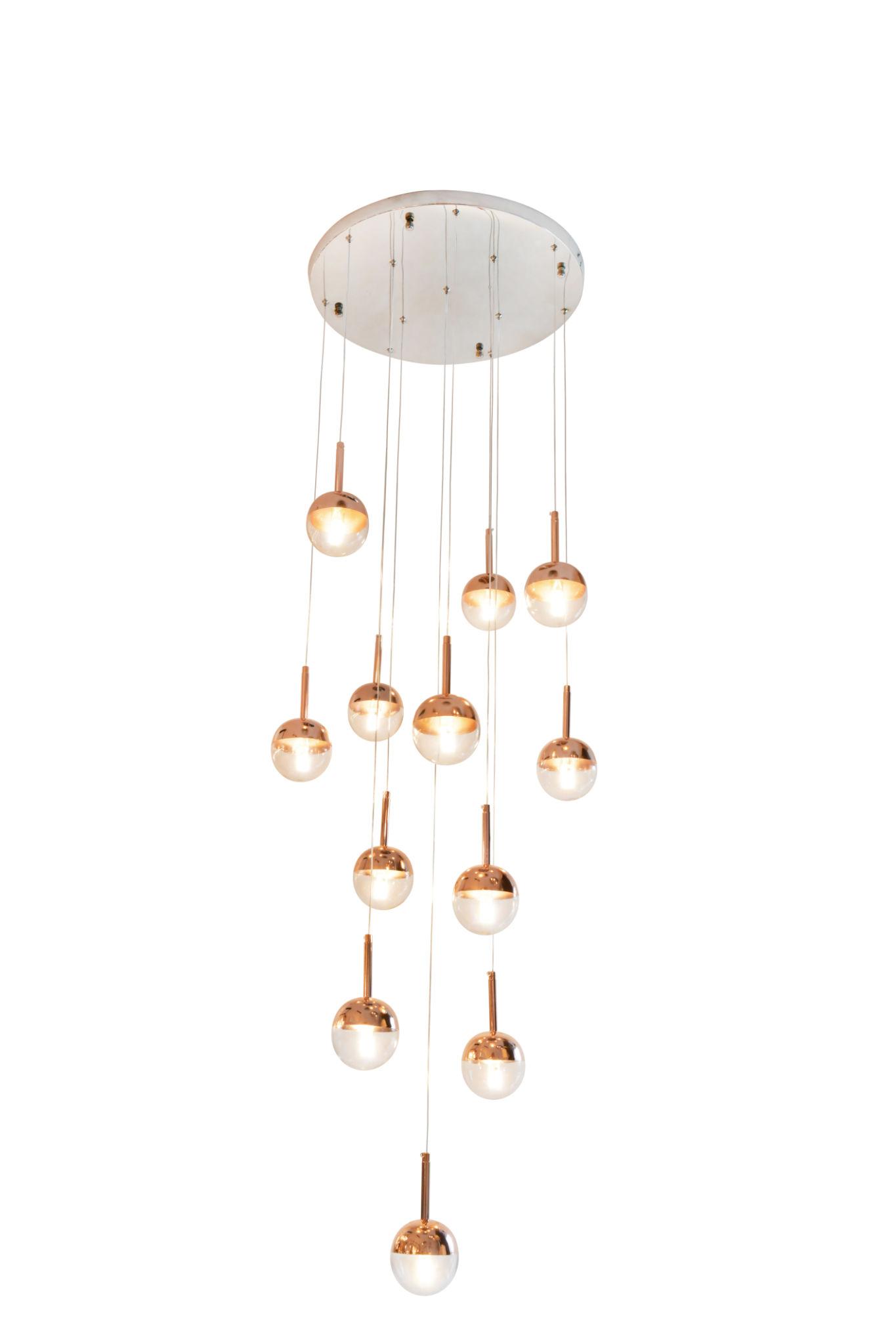 Front view of a decorative cluster pendant lighting composition.
