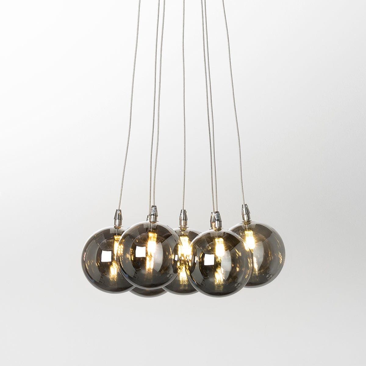 Front view of a decorative cluster pendant lighting composition.