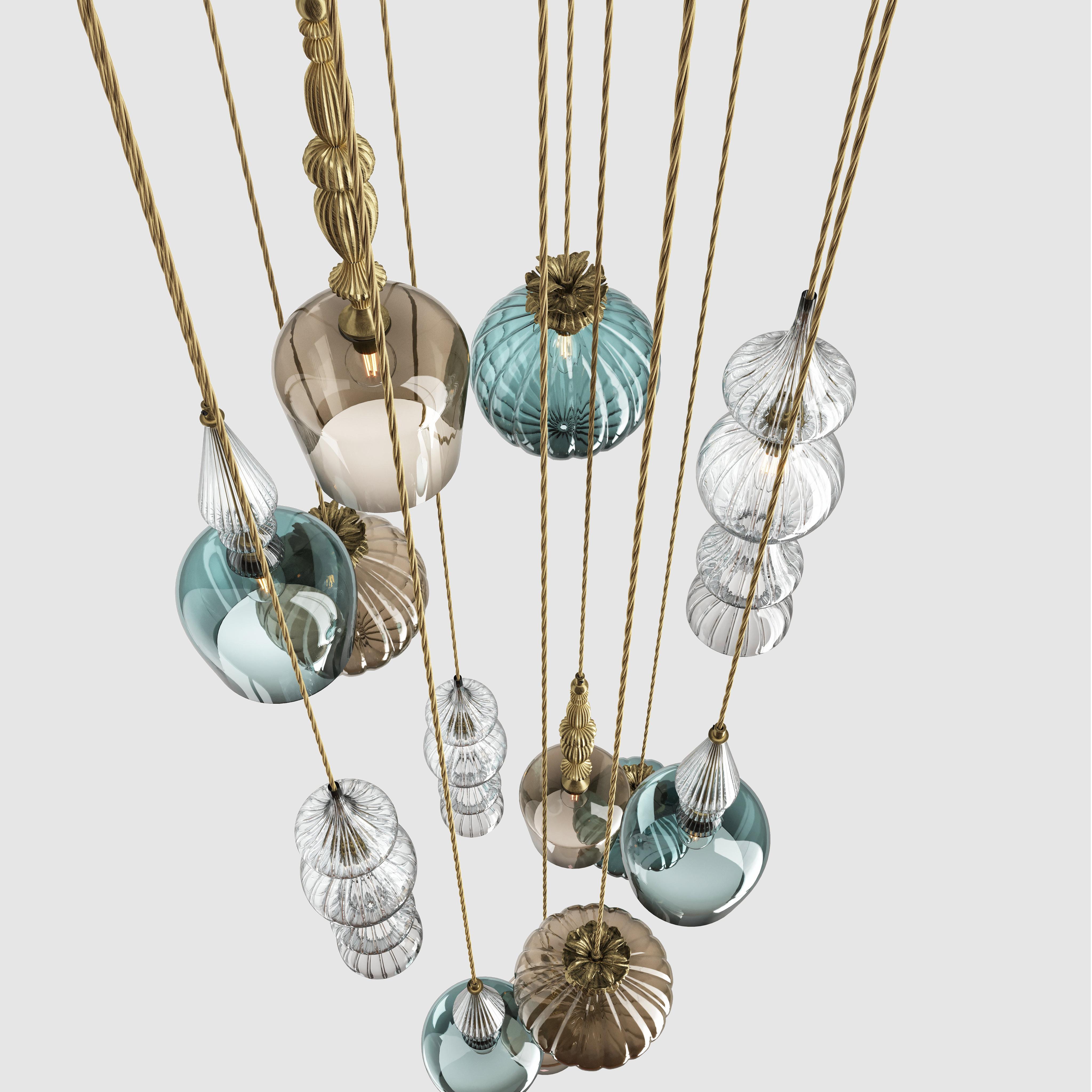 Front view of a decorative cluster pendant lighting composition.
