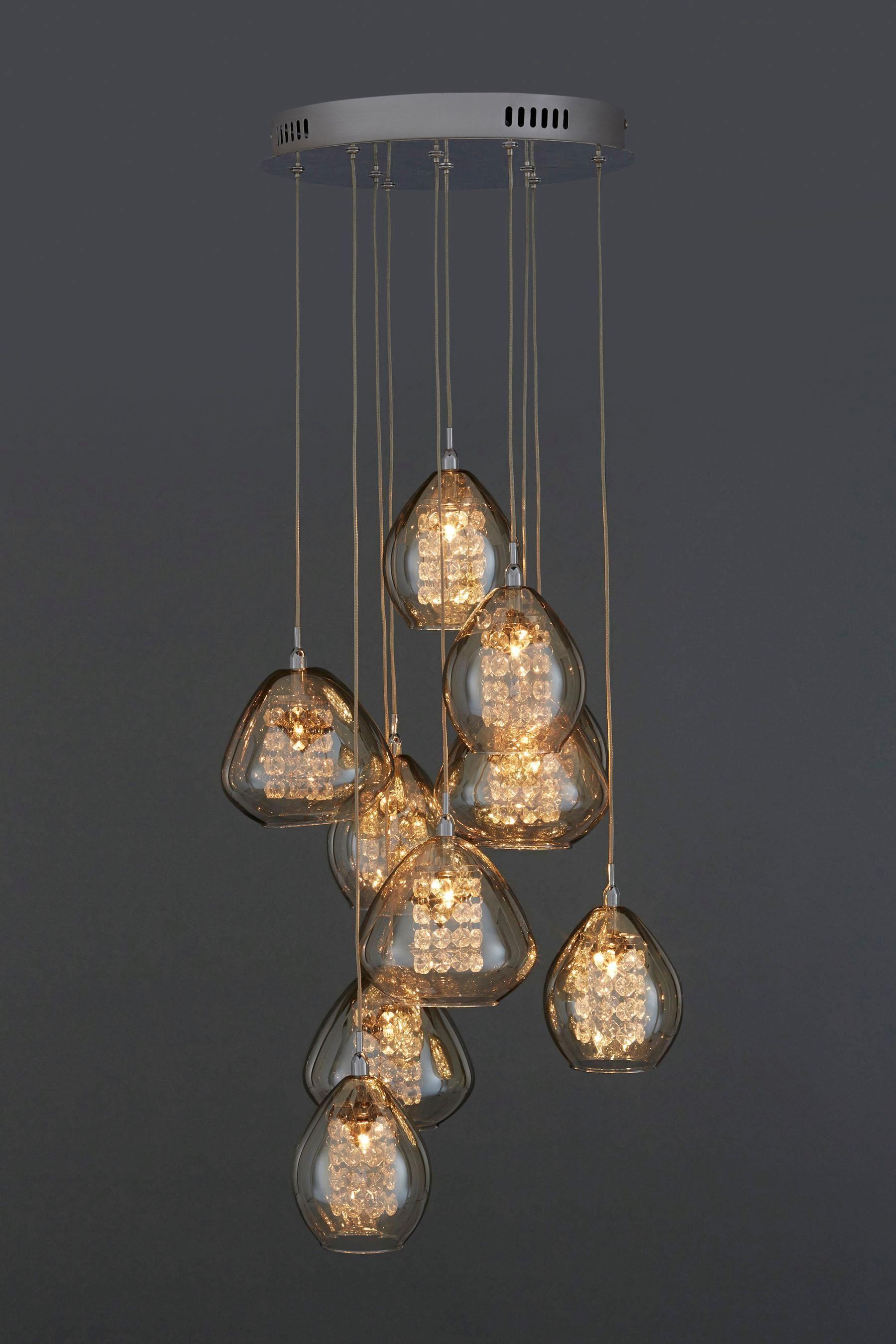Front view of a decorative cluster pendant lighting composition.