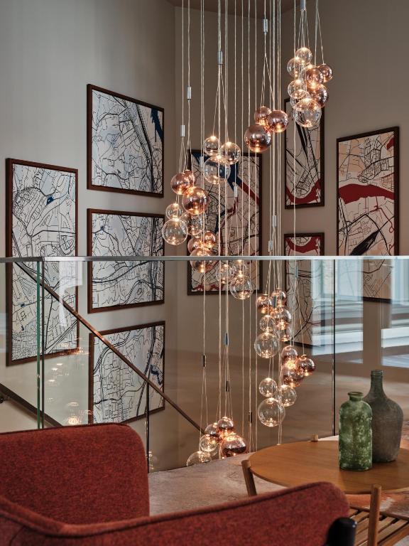 Cluster pendant lighting installed in a luxury hospitality interior.