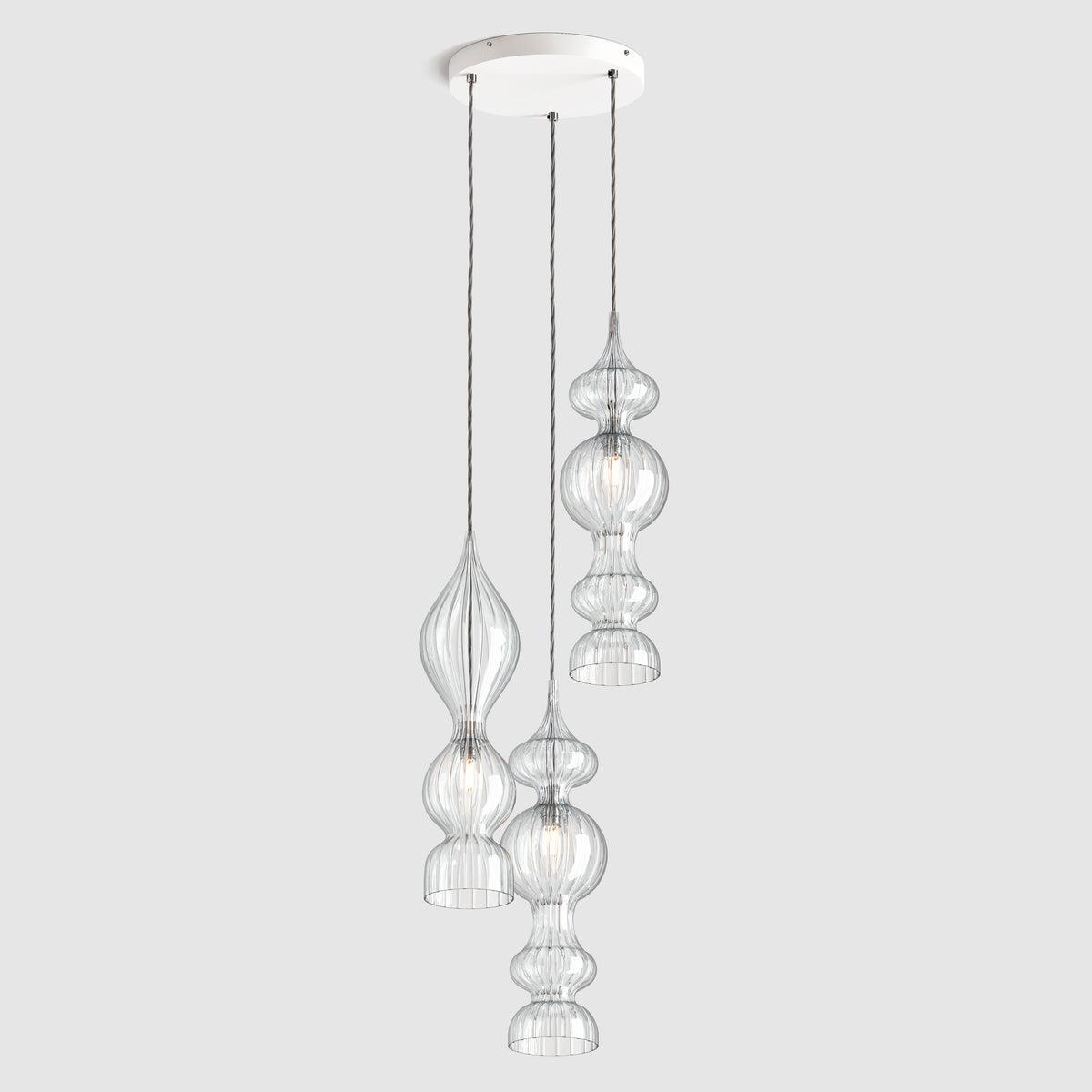 Front view of a decorative cluster pendant lighting composition.