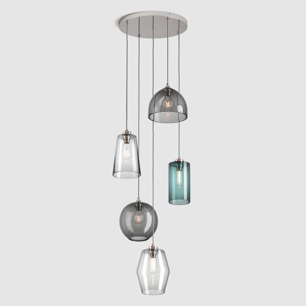 Front view of a decorative cluster pendant lighting composition.