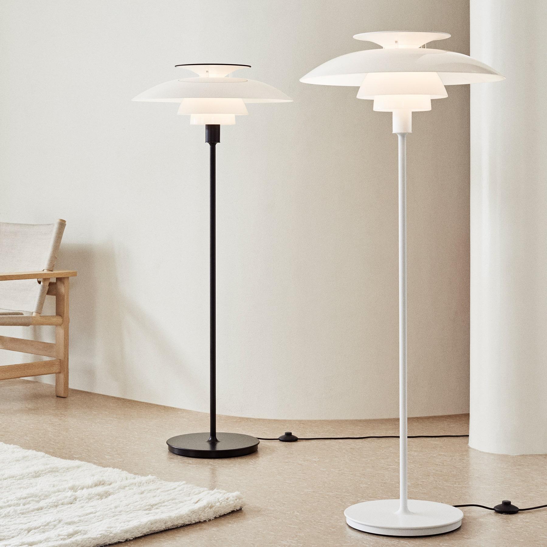 Collection of Scandinavian floor lamps featuring wood, metal and fabric combinations inspired by Nordic interiors.