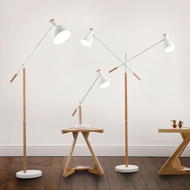Collection of Scandinavian floor lamps featuring wood, metal and fabric combinations inspired by Nordic interiors.