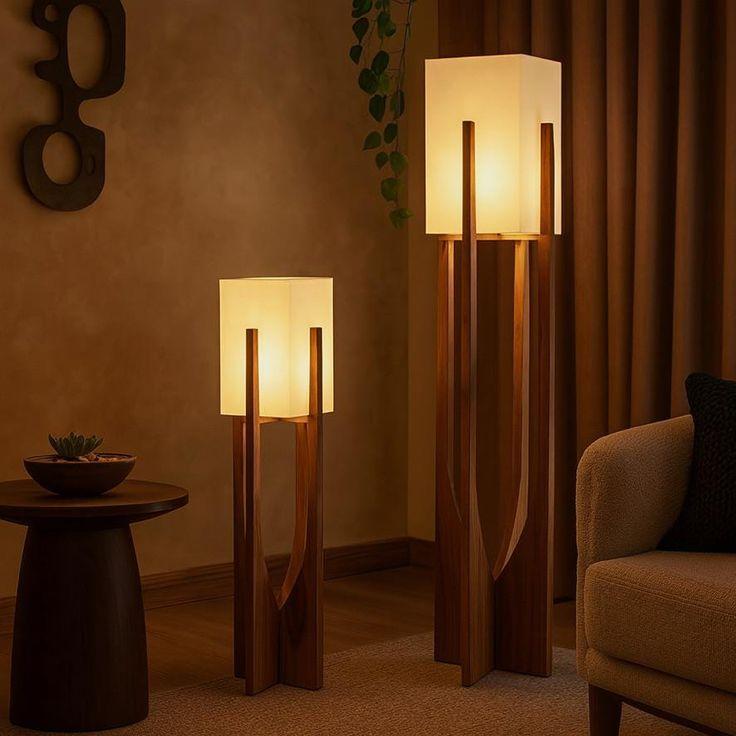 Scandinavian floor lamp positioned beside a lounge chair in a bright contemporary living room, creating warm and comfortable ambient lighting.