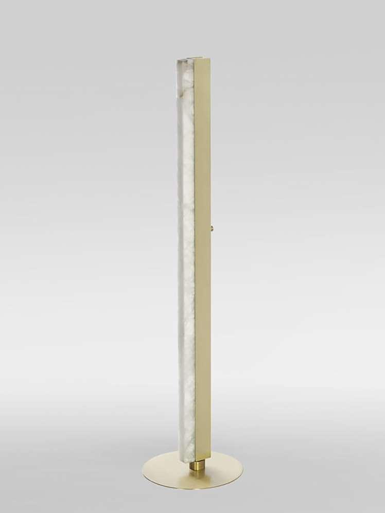 Front view of a marble floor lamp showcasing elegant proportions, luxurious natural stone and refined craftsmanship.