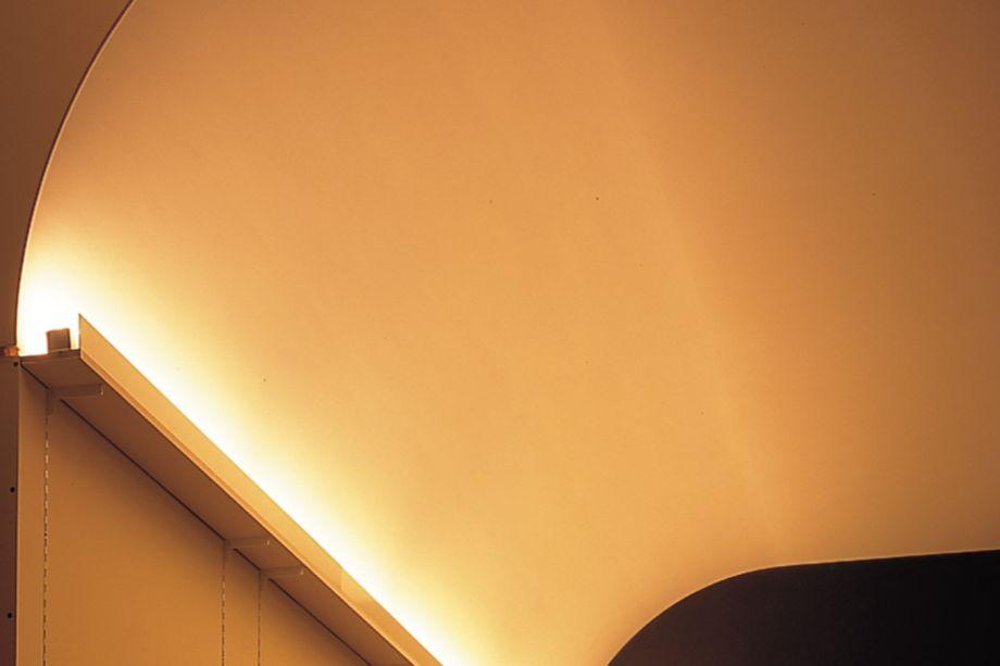 Cove lighting detail providing soft indirect illumination.