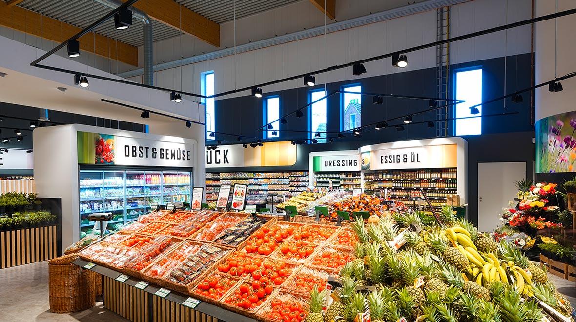 Supermarket lighting system for aisles, shelves, fresh-food areas and product displays in modern retail environments