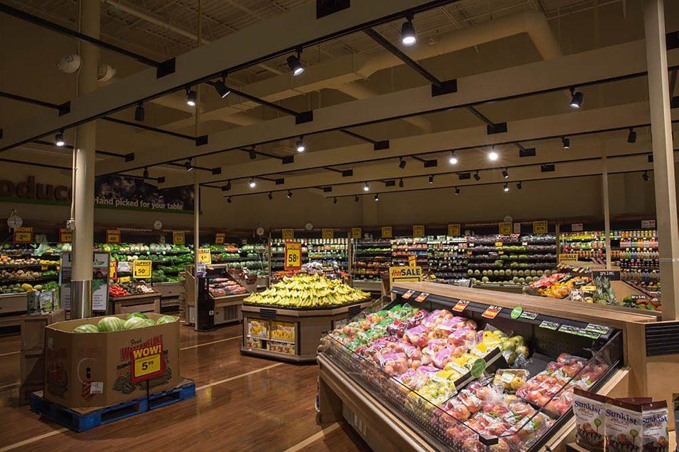 Supermarket lighting system for aisles, shelves, fresh-food areas and product displays in modern retail environments