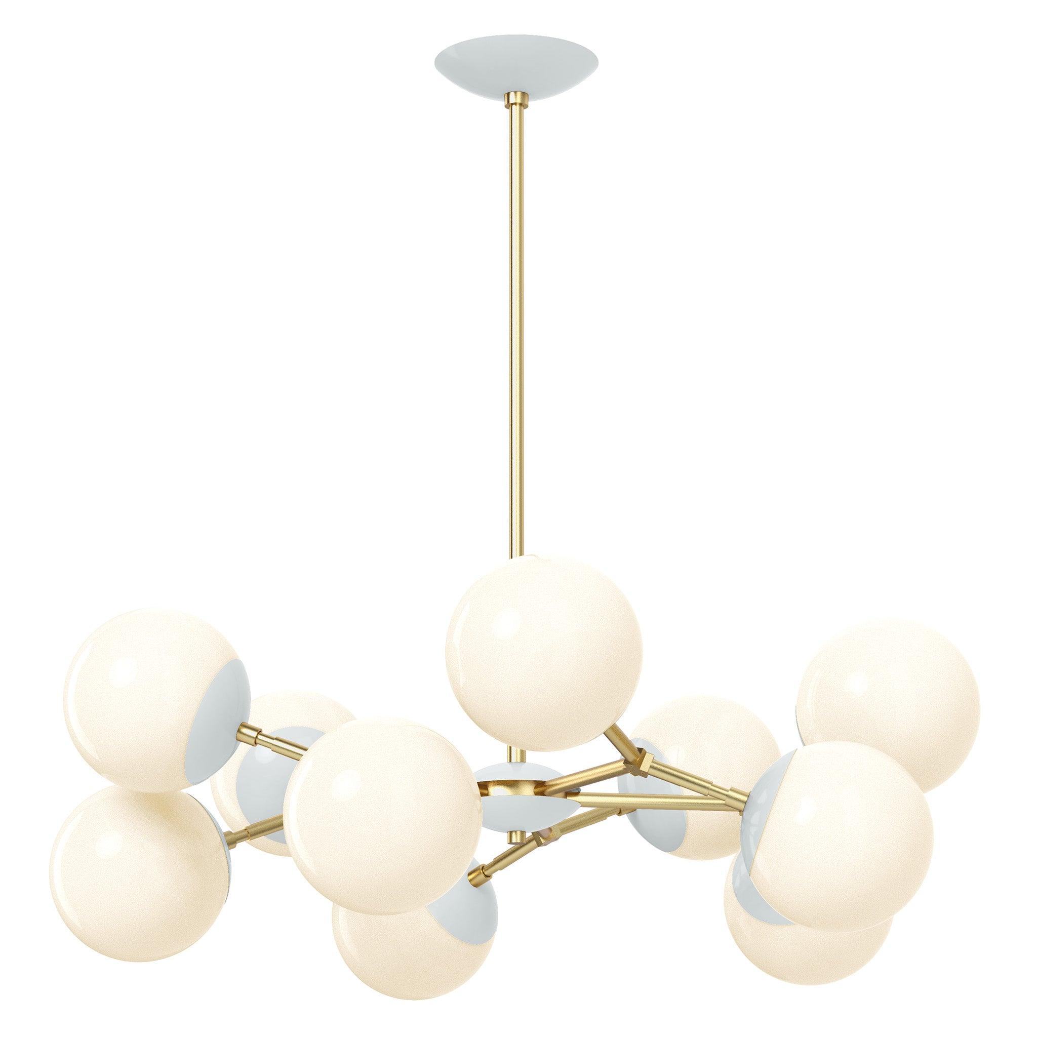 Globe chandelier photographed on a clean white studio background with multiple spherical glass diffusers.