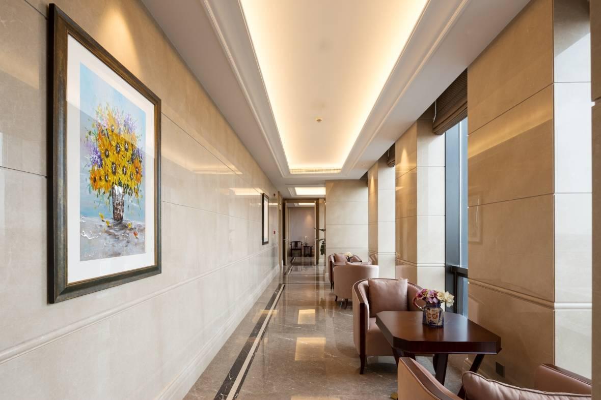 Ceiling cove lighting integrated into a contemporary hospitality interior.