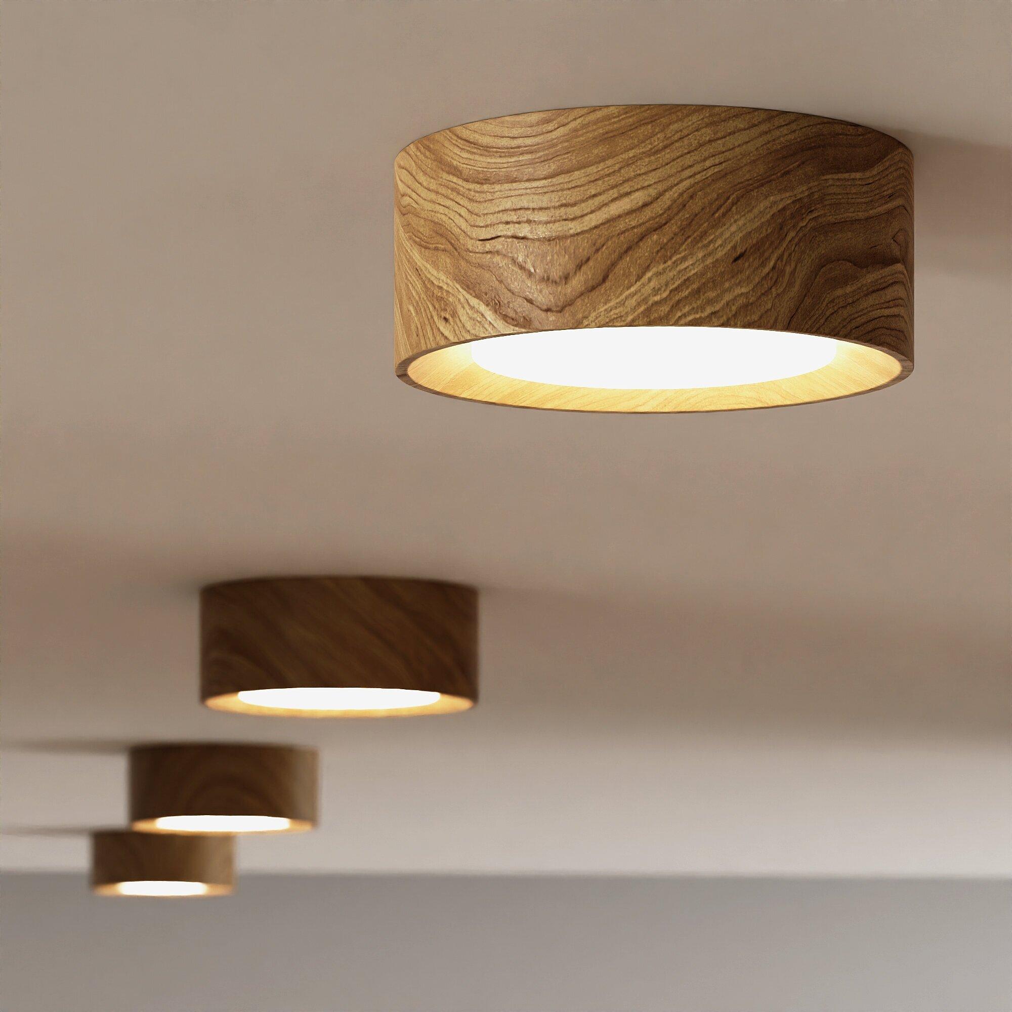 Collection of natural wood ceiling lights in different timber forms and finishes