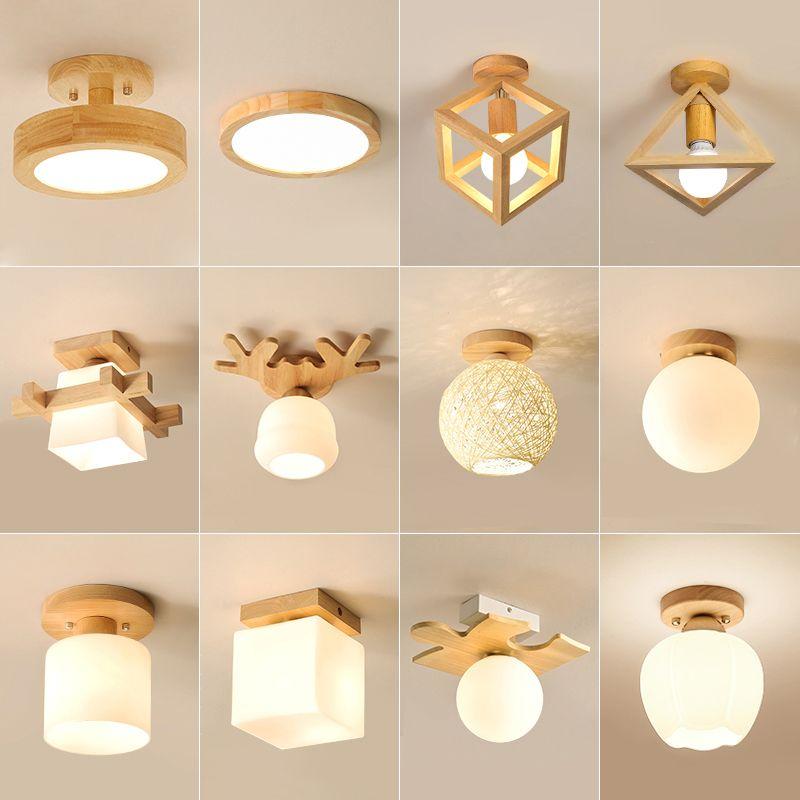 Collection of natural wood ceiling lights in different timber forms and finishes