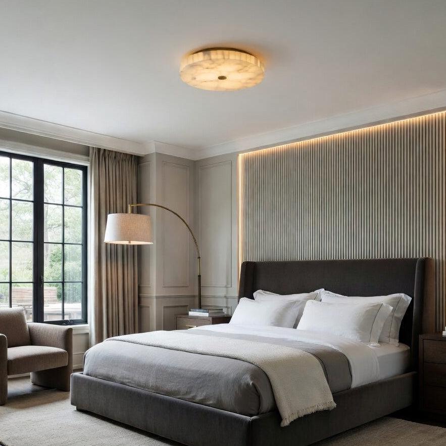 Marble ceiling lighting creating a refined decorative atmosphere in an elegant hospitality interior