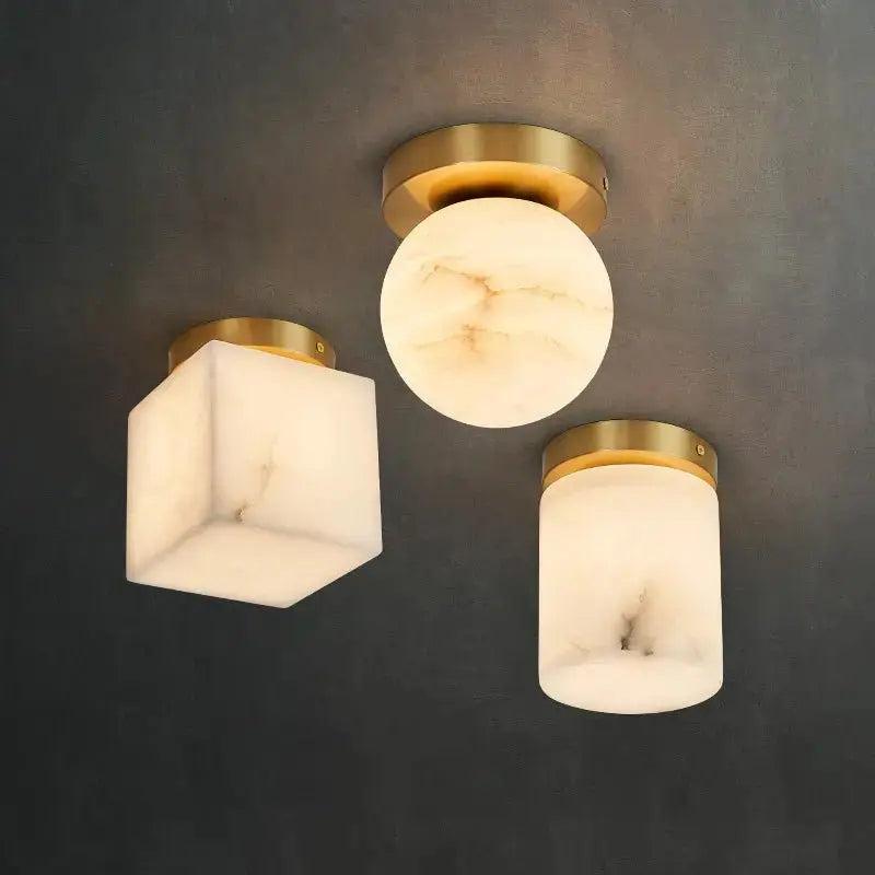 Marble ceiling light collection featuring different decorative designs with visible natural stone elements