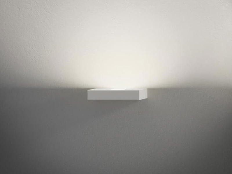 Front view of a minimalist architectural wall lamp.
