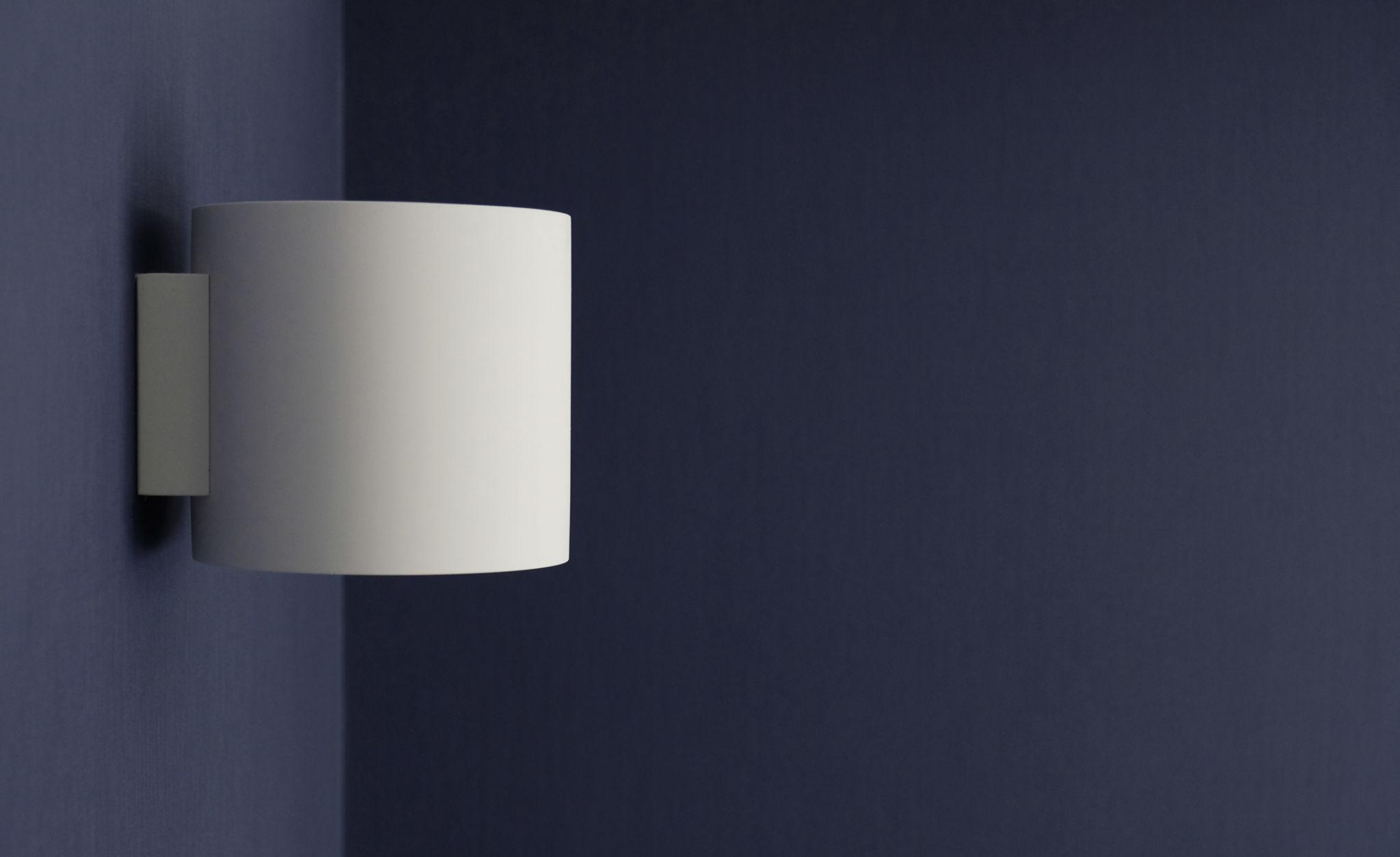 Front view of a minimalist architectural wall lamp.