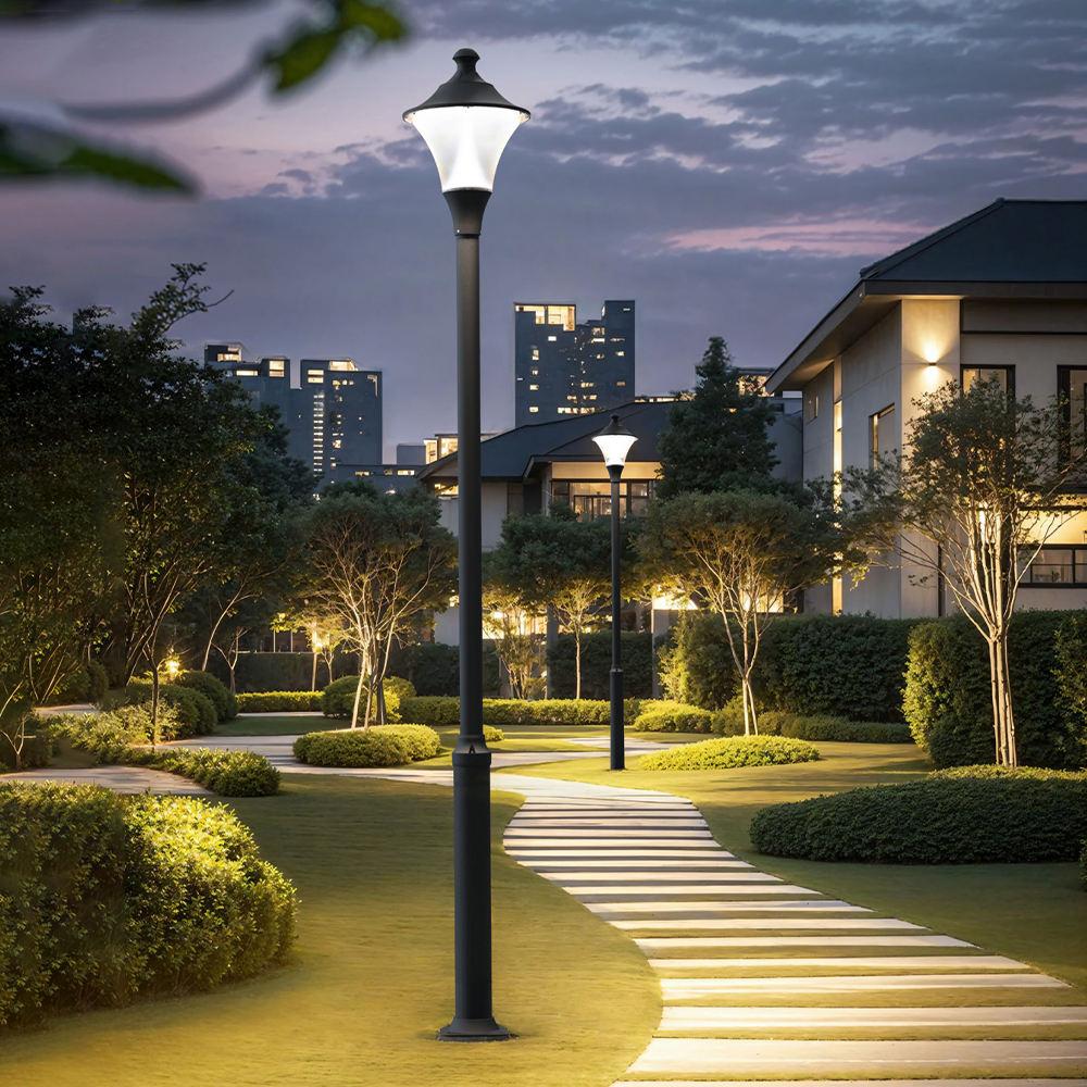 Decorative pole lights installed in a contemporary hospitality landscape.