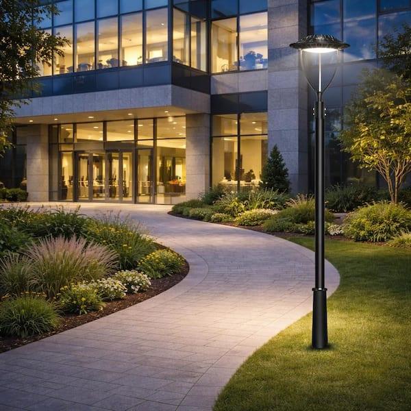 Decorative pole lights installed in a contemporary hospitality landscape.