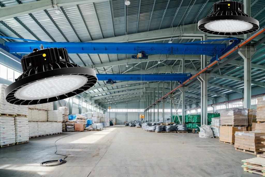 Smart highbay lights installed in a contemporary industrial environment.