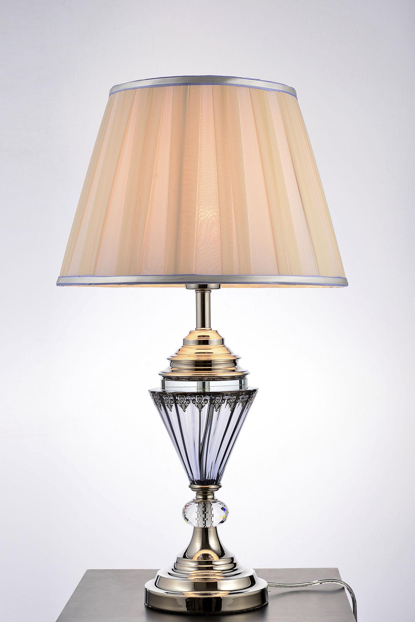 Front view of a crystal table lamp highlighting elegant crystal detailing and refined craftsmanship.