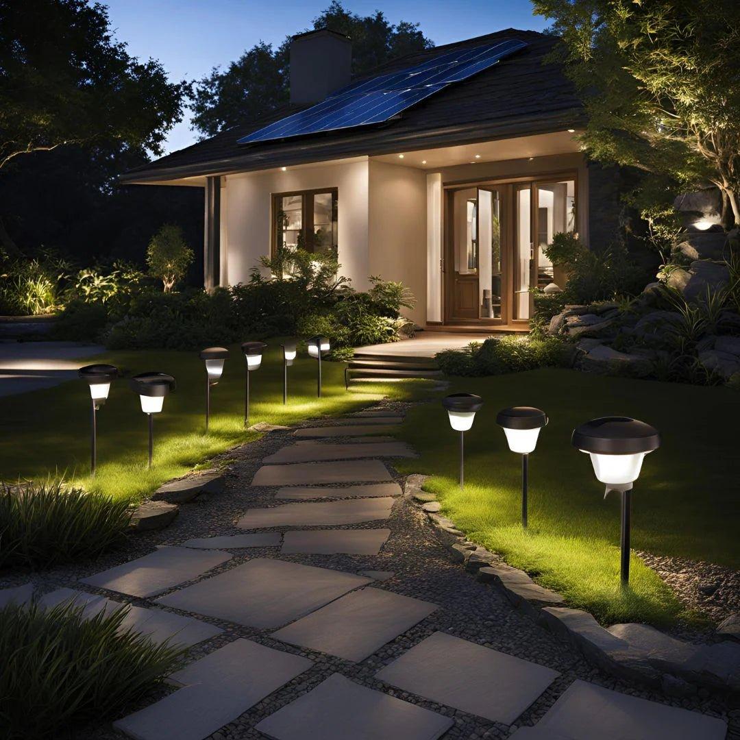 Solar garden lights illuminating a contemporary residential landscape.