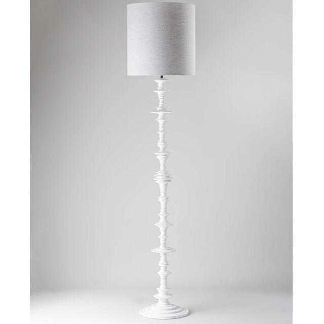 Front view of a luxury floor lamp highlighting sophisticated detailing and timeless architectural design.