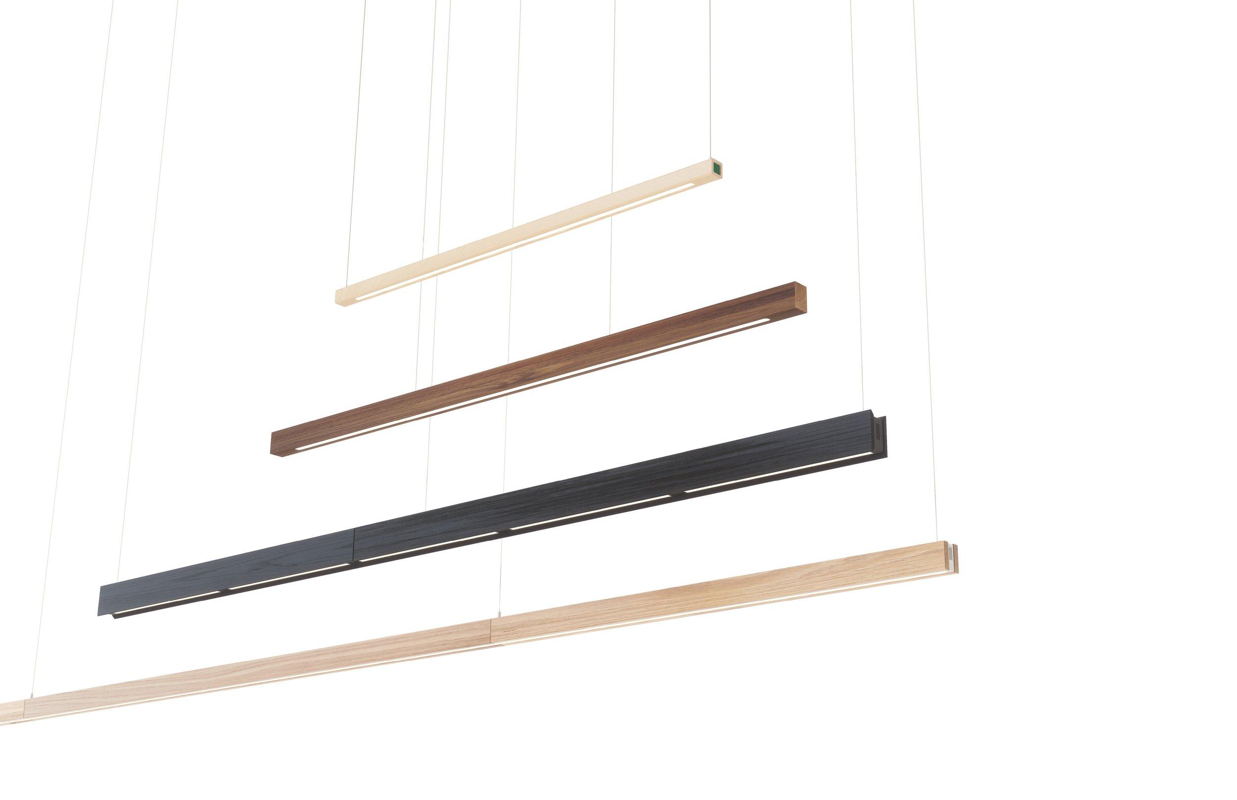 Linear pendant lighting family featuring multiple lengths and configurations.